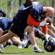 Illustration for article titled Kyle Long Tried To Beat A Teammate With His Own Helmet And Then Barfed
